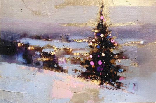 Decorated Christmas tree with lights on a snowy landscape