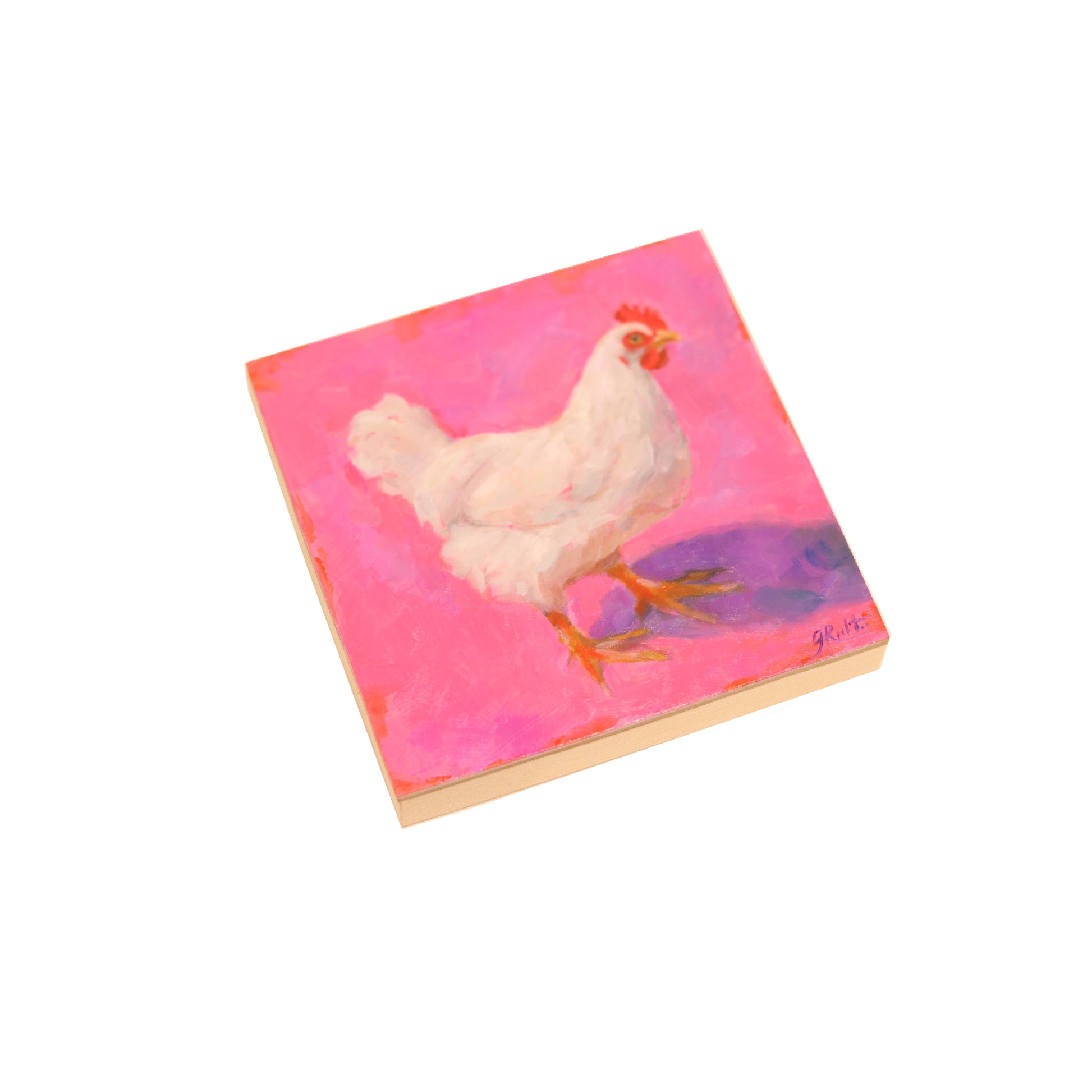 A 5x5” oil painting on panel depicting a white chicken standing against a vibrant pink background. The chicken is painted in an impressionistic style, with soft brushstrokes capturing the texture of its feathers. Its red comb and wattles contrast sharply with the white plumage, and a subtle purple shadow grounds the figure. The artist’s signature, ‘J. Richter,’ is visible in the lower right corner.