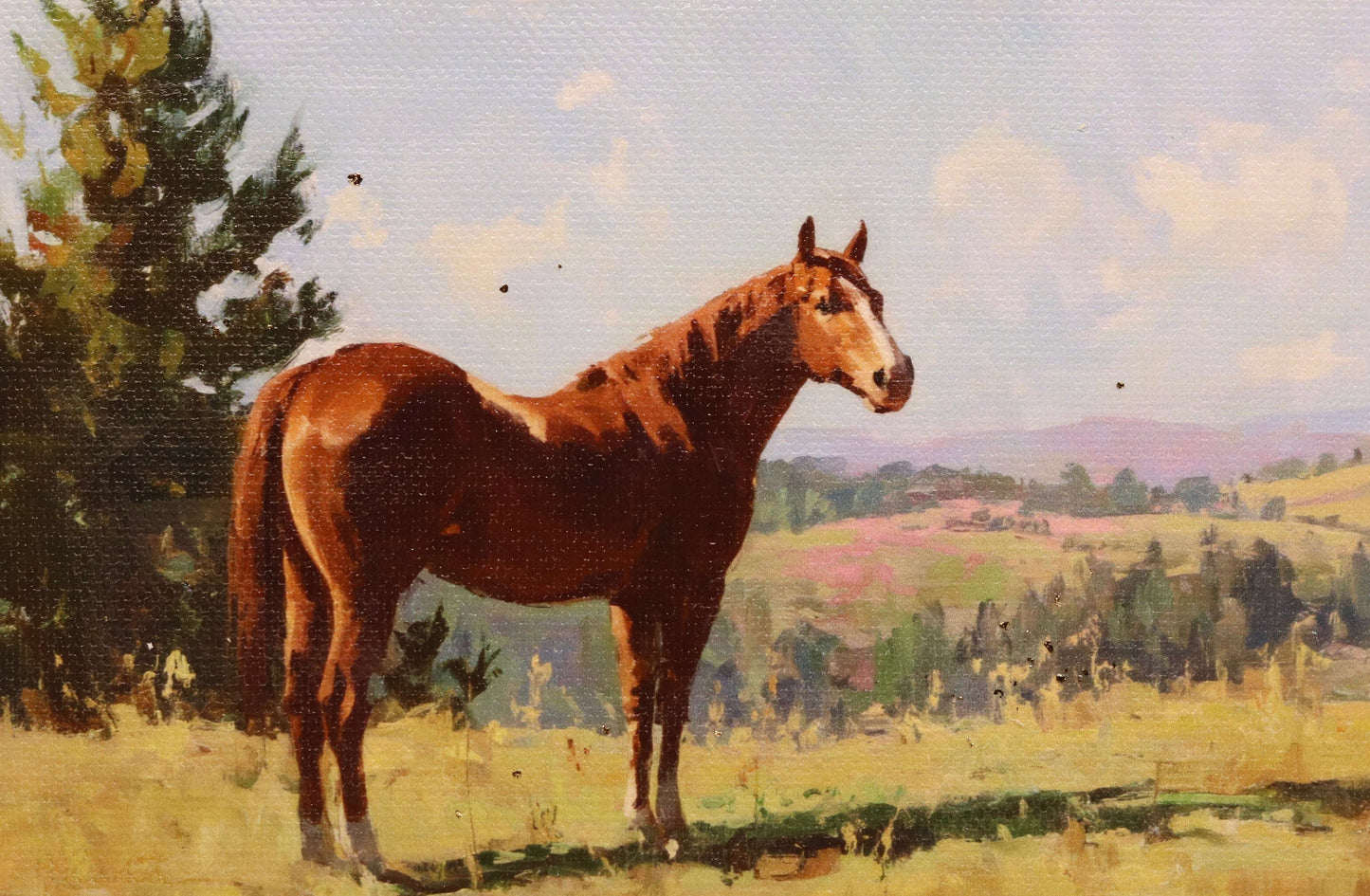 Painting of a brown horse standing in a field with trees and hills in the background