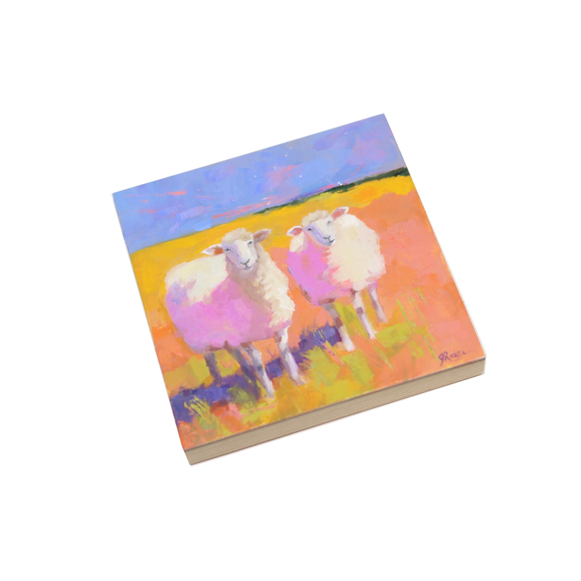 Oil painting on canvas by Jessica Richter, featuring two sheep standing in a sunlit field. Their woolly coats are illuminated with soft pink and purple hues, reflecting the warm light. The golden grass contrasts with the cool blue sky.